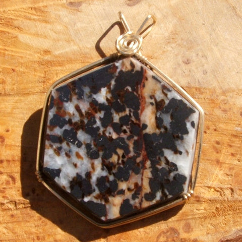 Wire Wrapped Zincite, Franklinite, and Calcite Pendant