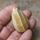 Yellow Calcite Palm Stone~CRYCPS02